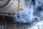 Exhaust smoke from a vehicle in winter, Shutterstock ID#2051386481