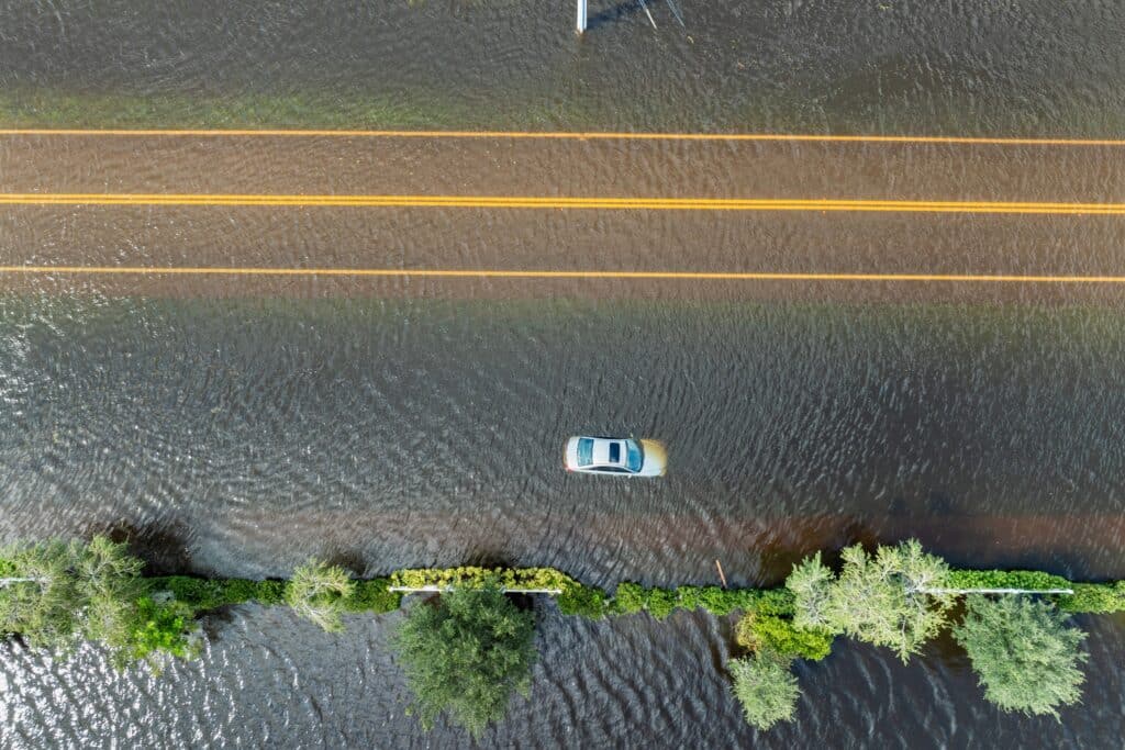 Car stuck on flooded road in Florida, Shutterstock ID#2528143705
